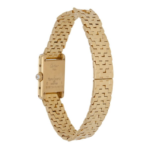 Reloj Cartier para dama modelo Tank en oro amarillo 18 kilates.