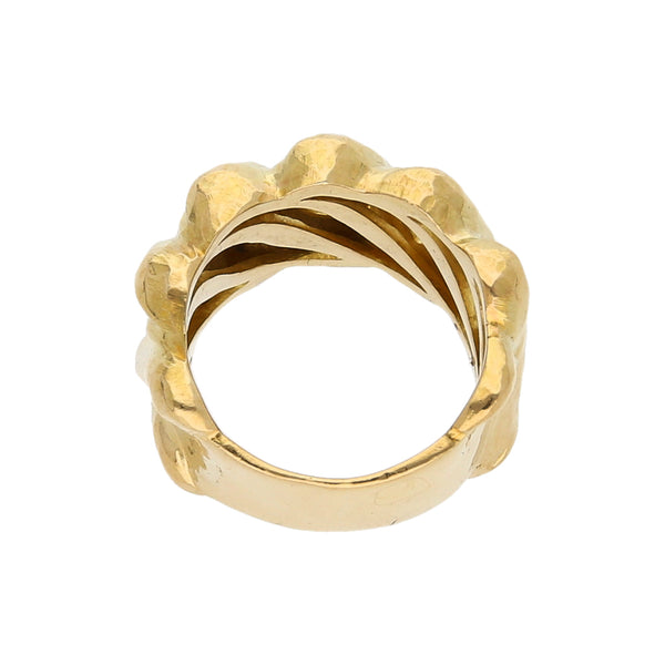 Anillo calado en oro amarillo 18 kilates.