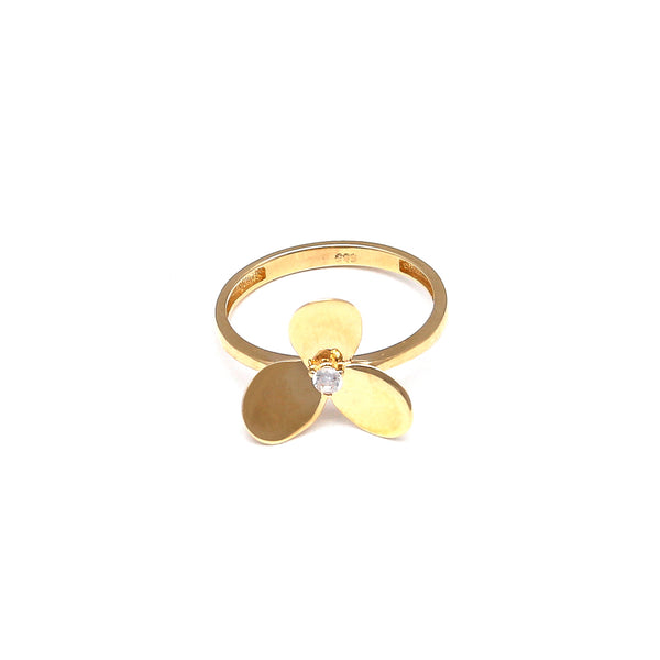 Anillo estilizado motivo floral con circonia en oro amarillo 14 kilates.