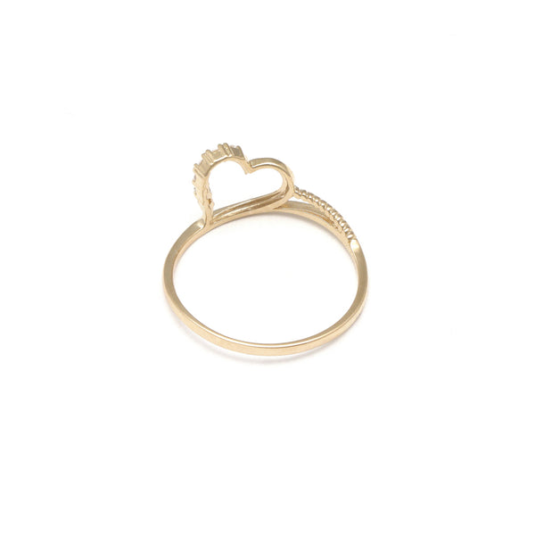 Anillo calado motivo corazón con circonias en oro amarillo 14 kilates.