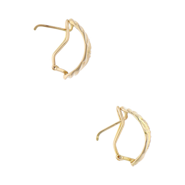 Aretes acanalados con circonias en oro amarillo 14 kilates.