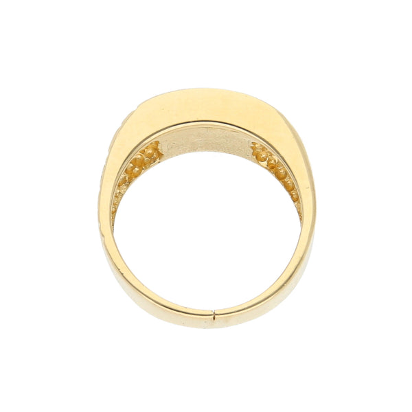 Anillo diseño especial con ónix en oro amarillo 14 kilates.