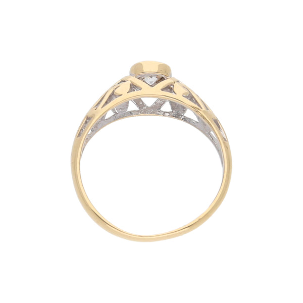 Anillo calado con circonia en oro amarillo 14 kilates.