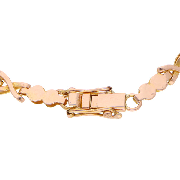 Pulsera eslabón combinado en oro rosa 18 kilates.