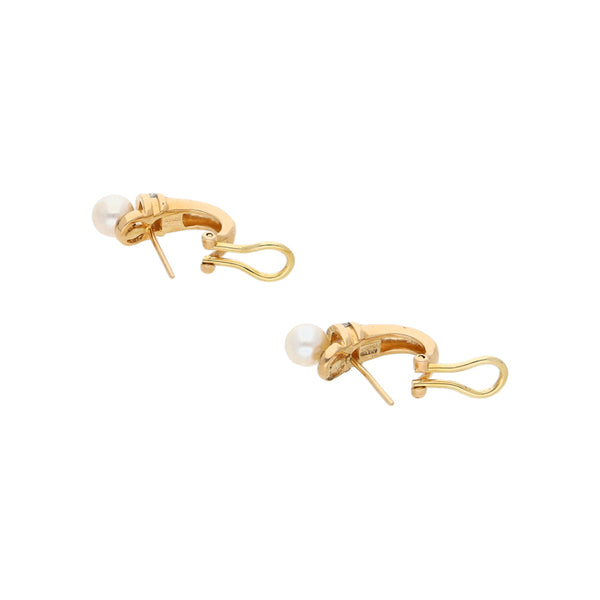 Aretes diseño especial con perlas y circonias en oro amarillo 14 kilates.