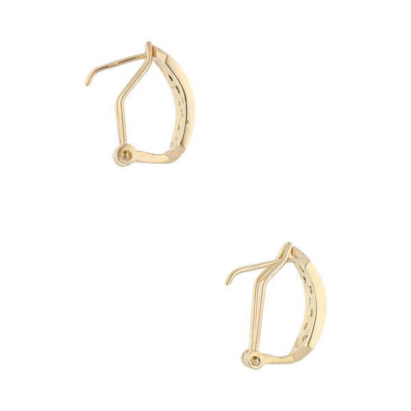 Aretes diseño especial con circonias en oro amarillo 14 kilates.