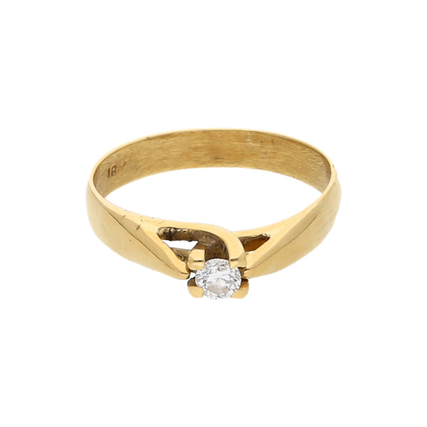 Anillo solitario con diamante en oro amarillo 18 kilates.