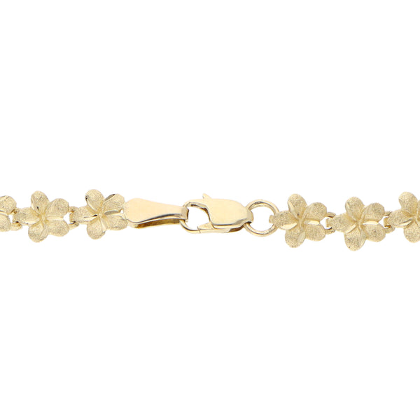 Pulsera eslabón articulado motivo floral en oro amarillo 14 kilates.