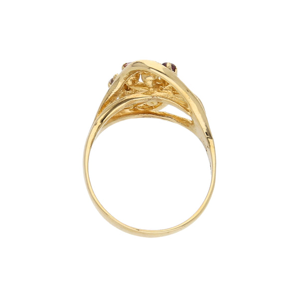 Anillo calado con sintéticos en oro amarillo 14 kilates.