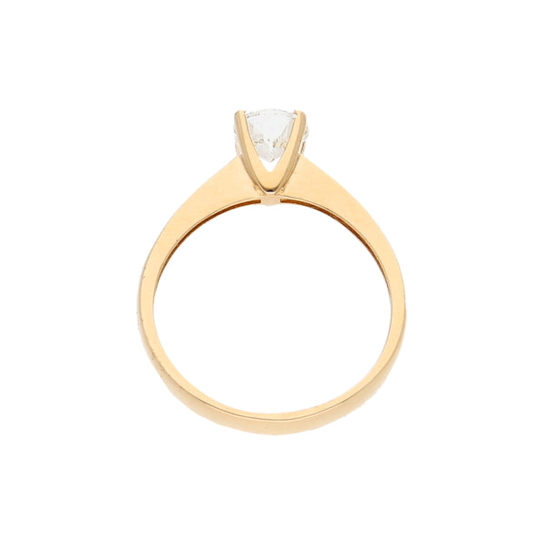 Anillo solitario con diamante en oro amarillo 14 kilates.