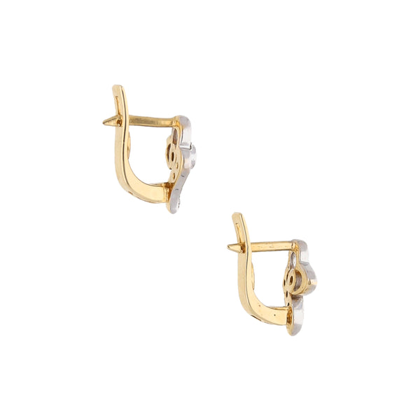 Aretes calados con circonias en oro amarillo 14 kilates.