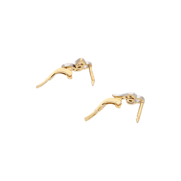 Aretes calados con circonias en oro amarillo 14 kilates.