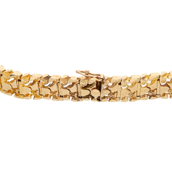 Pulsera eslabón articulado en oro amarillo 14 kilates.