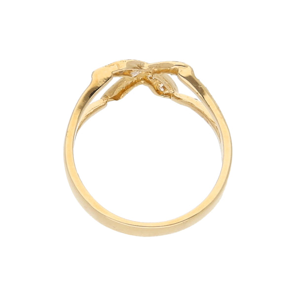 Anillo calado con circonias en oro amarillo 14 kilates.