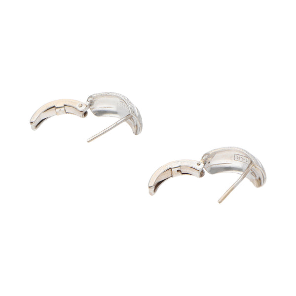 Aretes labrados en oro blanco 14 kilates.