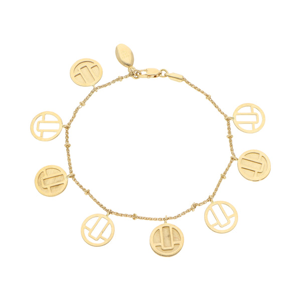 Pulsera eslabón encontrado doble con dijes en oro amarillo 18 kilates.