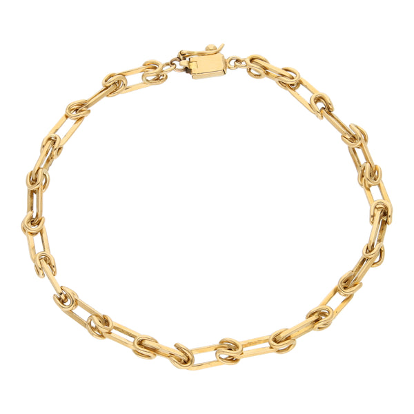 Pulsera eslabón combinado en oro amarillo 18 kilates.