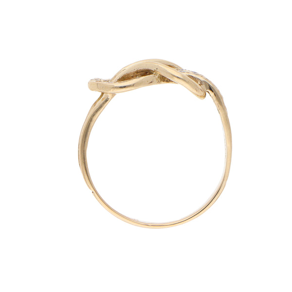 Anillo calado con circonias en oro amarillo 14 kilates.