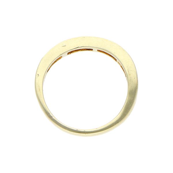 Anillo ondulado con sintéticos en oro amarillo 14 kilates.