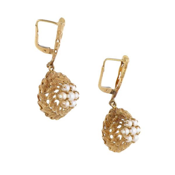 Aretes diseño especial con perlas en oro amarillo 14 kilates.