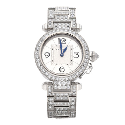 Reloj Cartier para dama modelo Pasha en oro blanco 18 kilates.