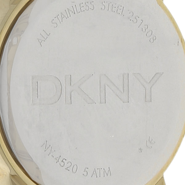 Reloj DKNY para dama en acero chapa.