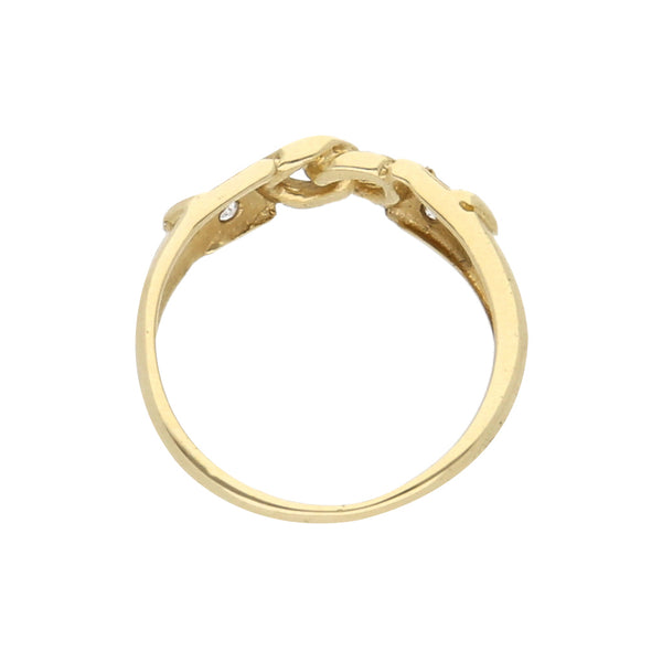 Anillo calado con circonias en oro amarillo 14 kilates.