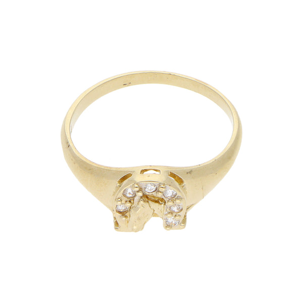 Anillo diseño especial motivo caballo con herrradura y circonias en oro amarillo 14 kilates.