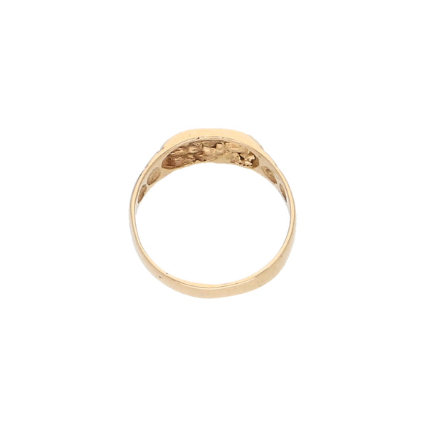 Anillo infantil tipo sello en oro amarillo 14 kilates.