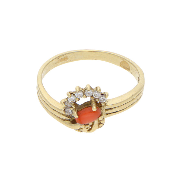 Anillo diseño especial con coral y circonias en oro amarillo 14 kilates.