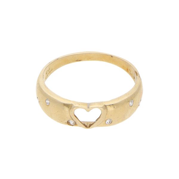 Anillo calado motivo corazón con sintéticos en oro amarillo 14 kilates.