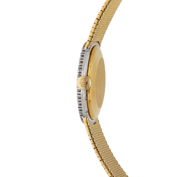 Reloj Baume & Mercier para dama en oro amarillo 18 kilates vistas en tono blanco.