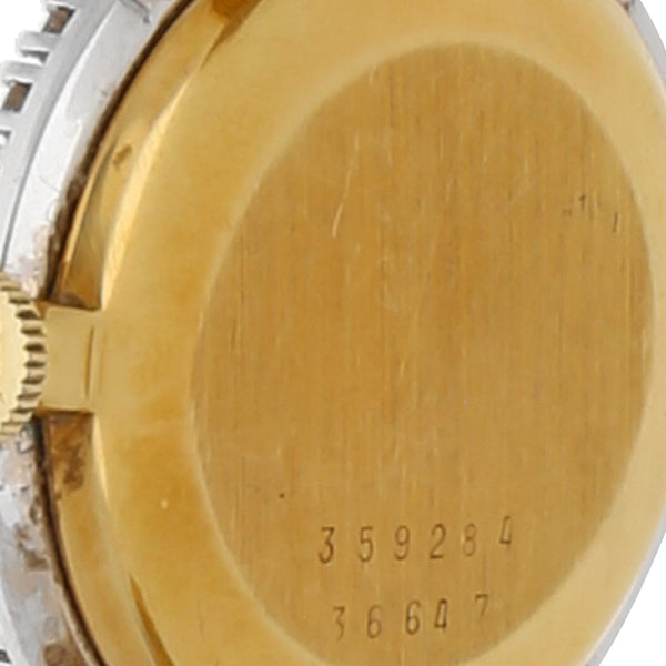 Reloj Baume & Mercier para dama en oro amarillo 18 kilates vistas en tono blanco.