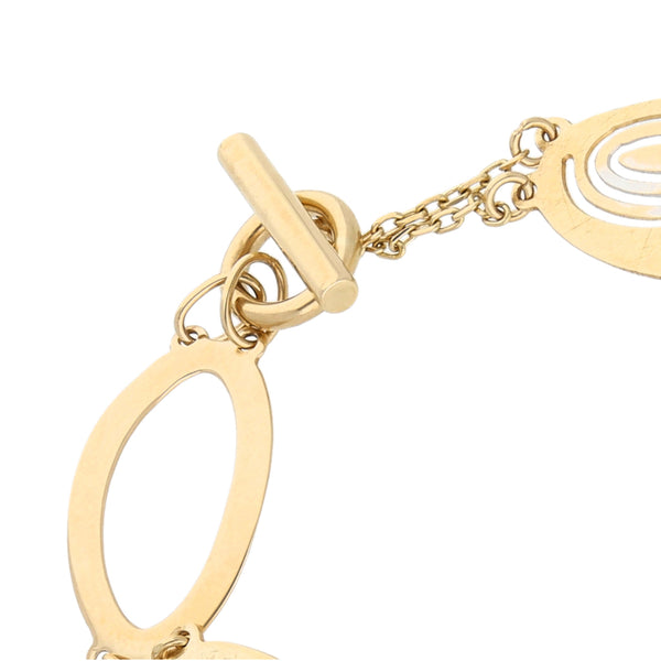 Pulsera eslabón combinado con circonias en oro amarillo 14 kilates.