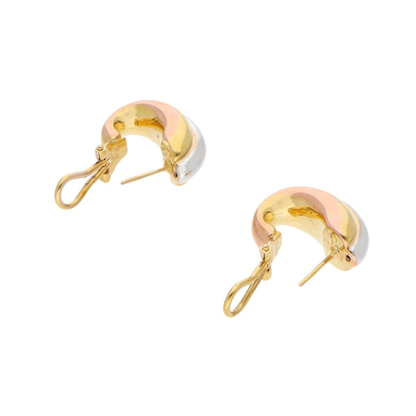 Aretes huecos en oro dos tonos 14 kilates.