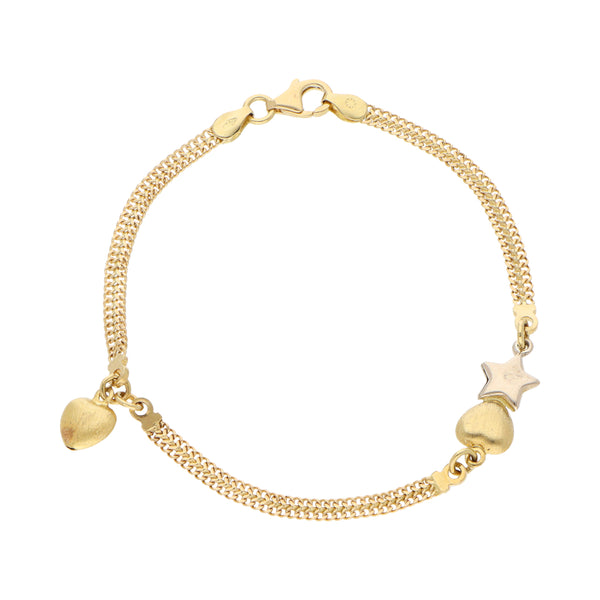 Pulsera eslabón combinado con colgante y aplicaciones motivo corazón y estrella en oro dos tonos 18 kilates.