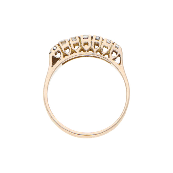 Anillo diseño especial con sintéticos en oro amarillo 8 kilates.