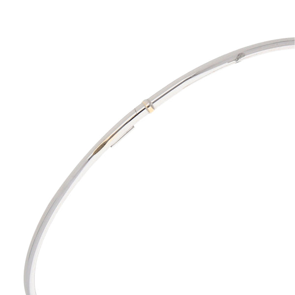 Pulsera de arillo hueca en oro blanco 14 kilates.