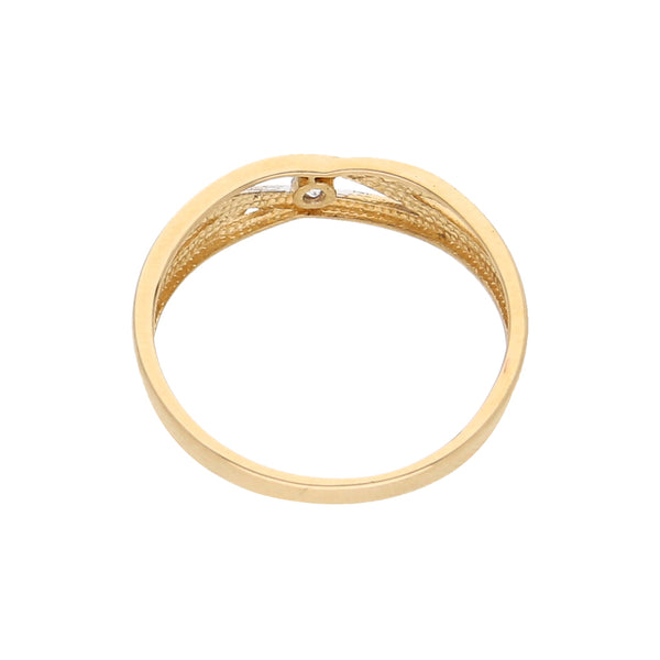 Anillo calado con circonia en oro amarillo 14 kilates.