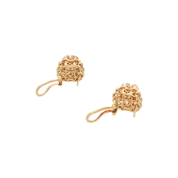 Aretes estilizados con sintéticos en oro amarillo 14 kilates.