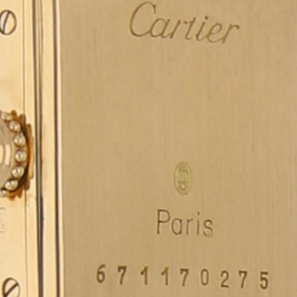 Reloj Cartier para dama modelo Tank Louis caja en oro amarillo 18 kilates.