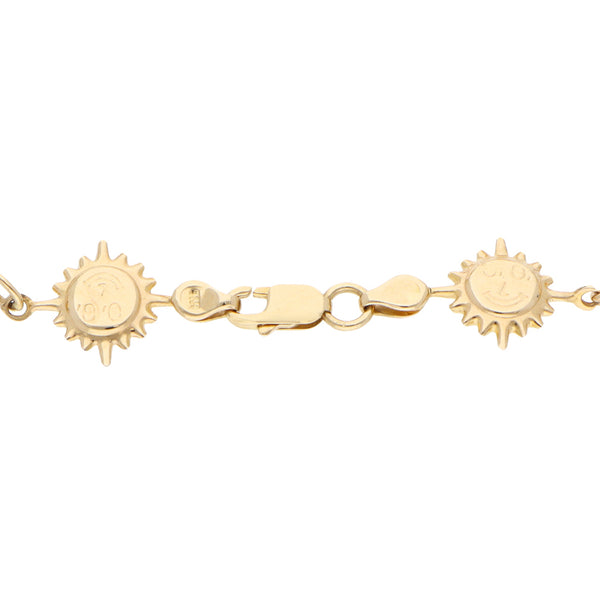 Pulsera eslabón combinado motivos sol y estrella en oro amarillo 14 kilates.