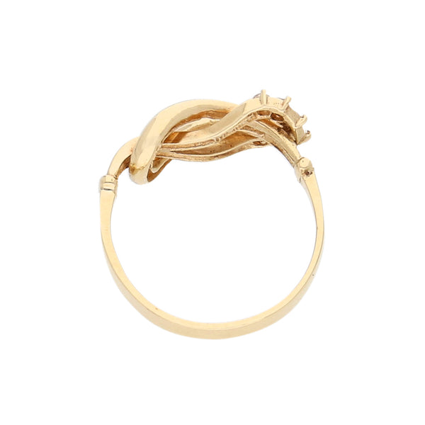 Anillo calado con circonias en oro amarillo 14 kilates.