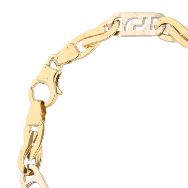 Pulsera eslabón combinado en oro dos tonos 14 kilates.