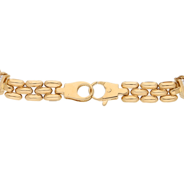 Pulsera eslabón combinado con sintéticos en oro amarillo 14 kilates.