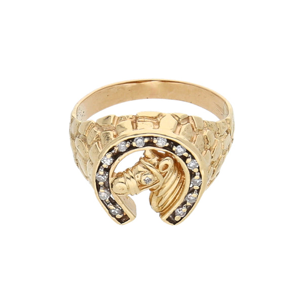 Anillo diseño especial motivo caballo con herradura y diamantes en oro amarillo 14 kilates.