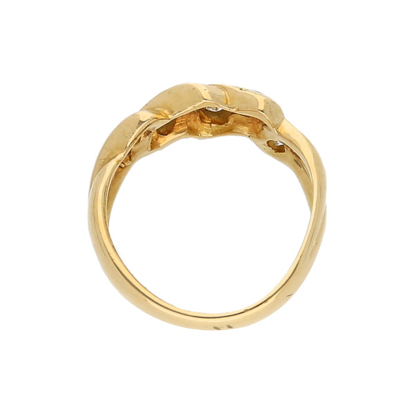 Anillo diseño especial con sintéticos en oro amarillo 18 kilates.