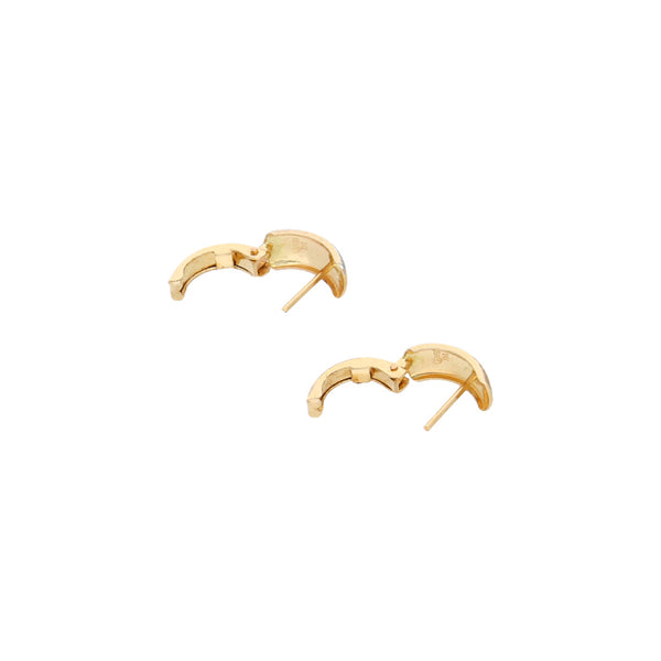 Aretes labrados en oro amarillo 14 kilates.