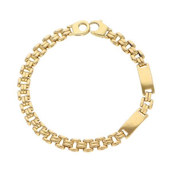 Pulsera eslabón combinado con aplicaciones en oro amarillo 18 kilates.