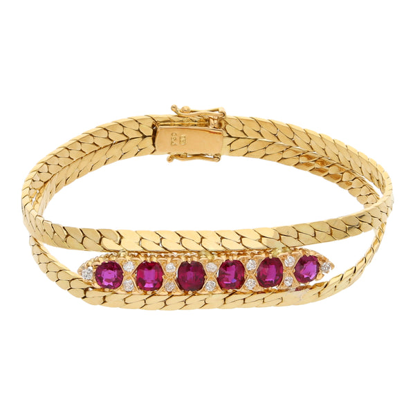 Pulsera dos hilos eslabón planchado con diamantes y rubíes en oro amarillo 18 kilates.